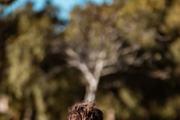 a young man is doing push ups in the grass