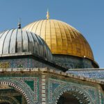 Brightly detailed capture of the iconic Dome of the Rock in Jerusalem, showcasing intricate Islamic architecture.
